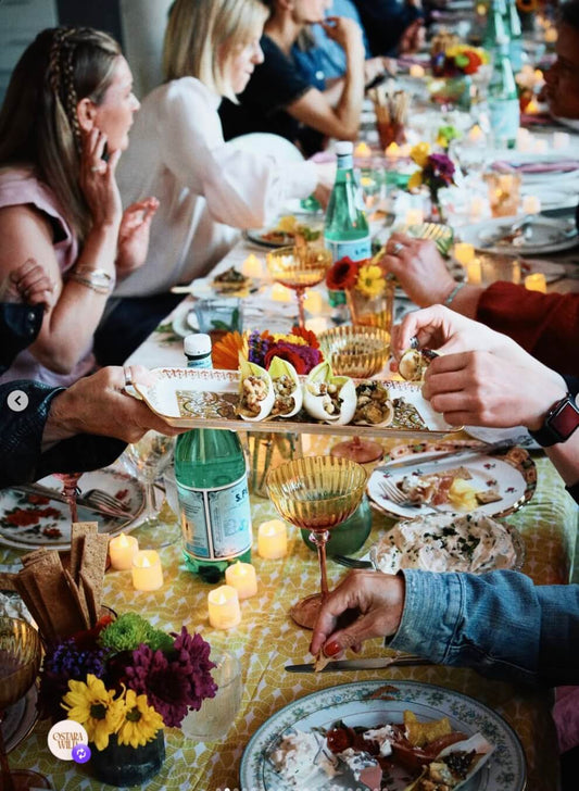 Guests at a long-table supper club at West Hove Studio, a venue for hire in Hove
